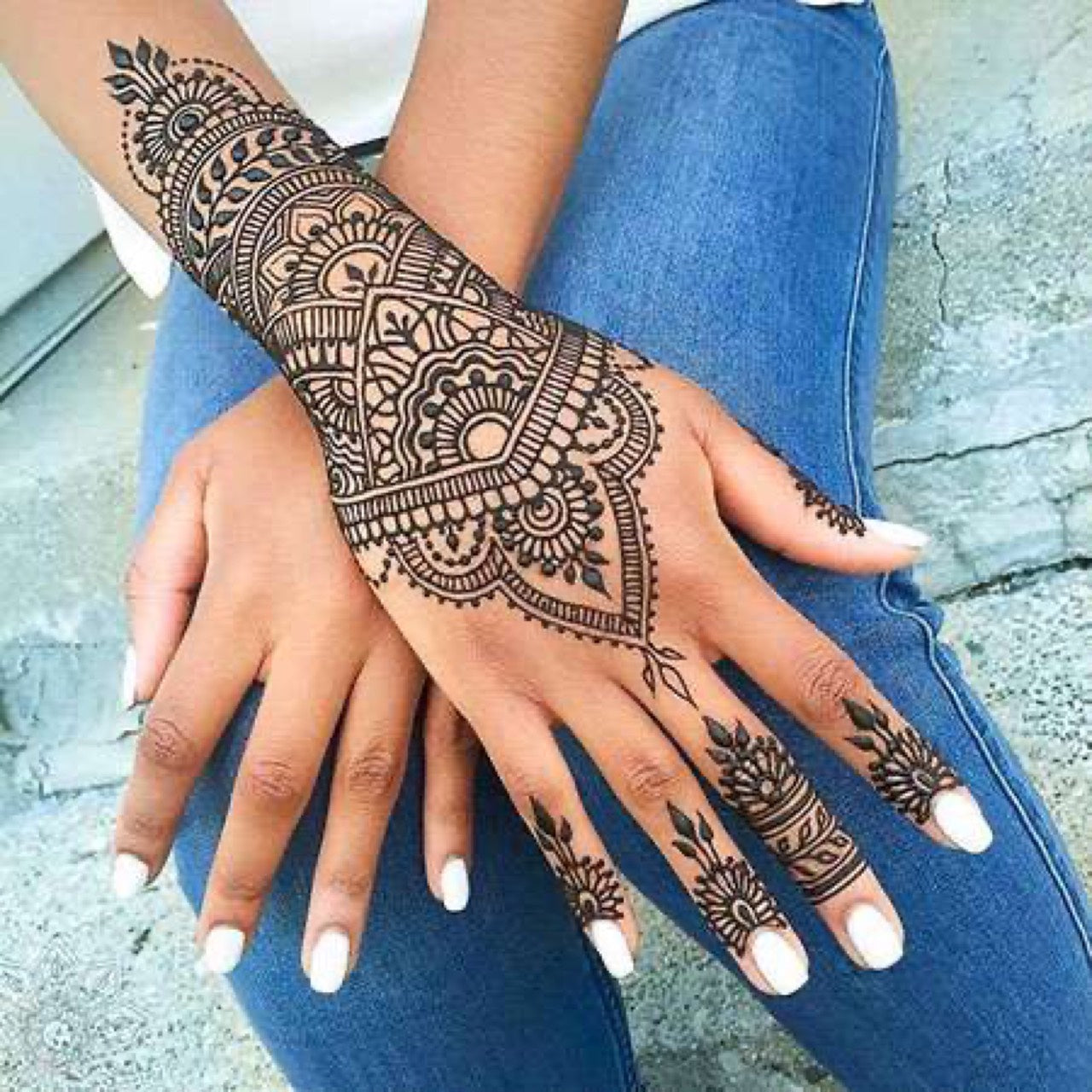 Mandala henna on a hand